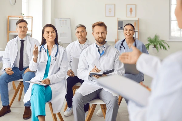 group-happy-doctors-listens-speaker-600nw-2483483115